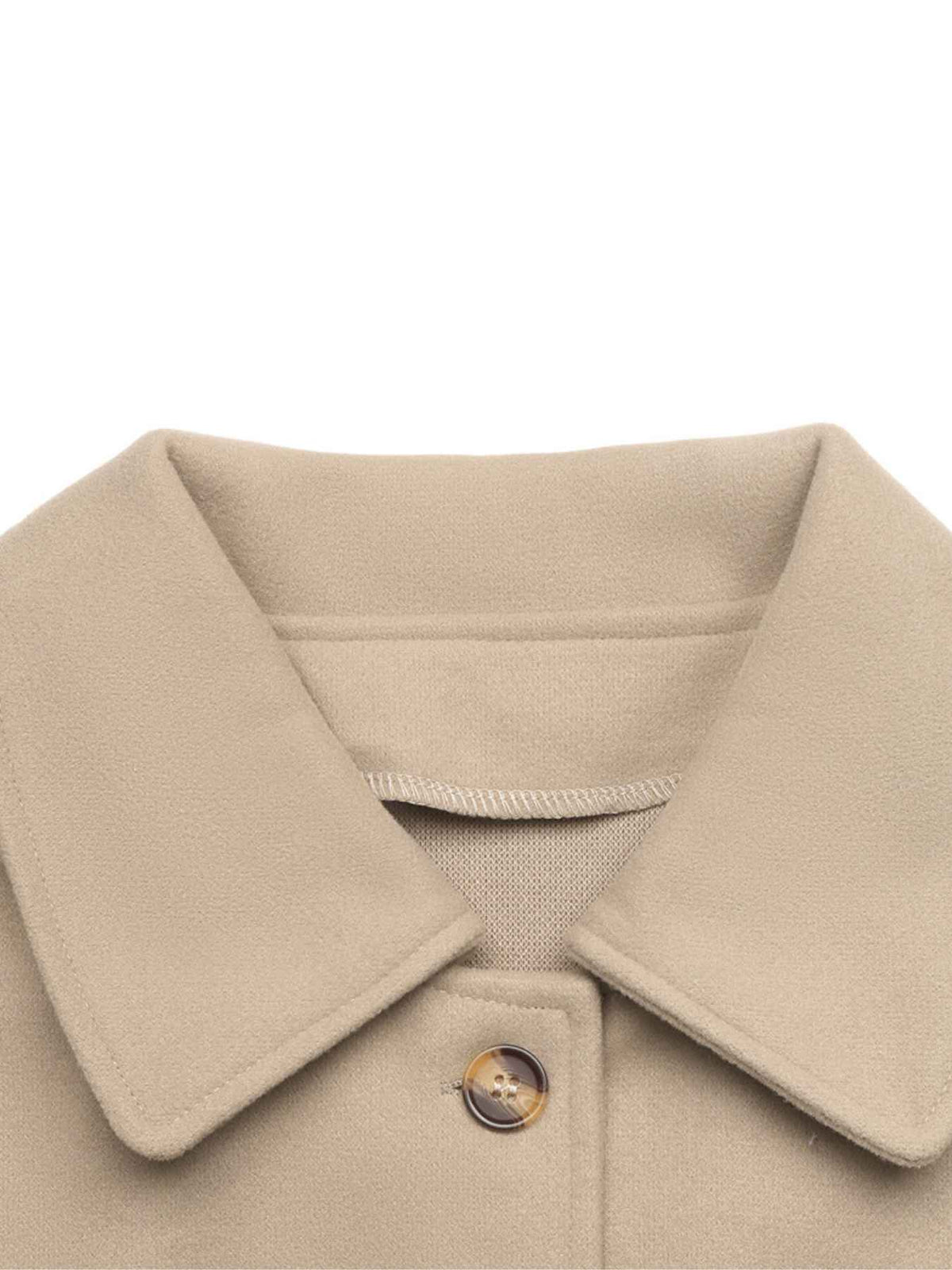 Close-up of a beige collared coat or sweater with a single visible button, shown against a plain white background.