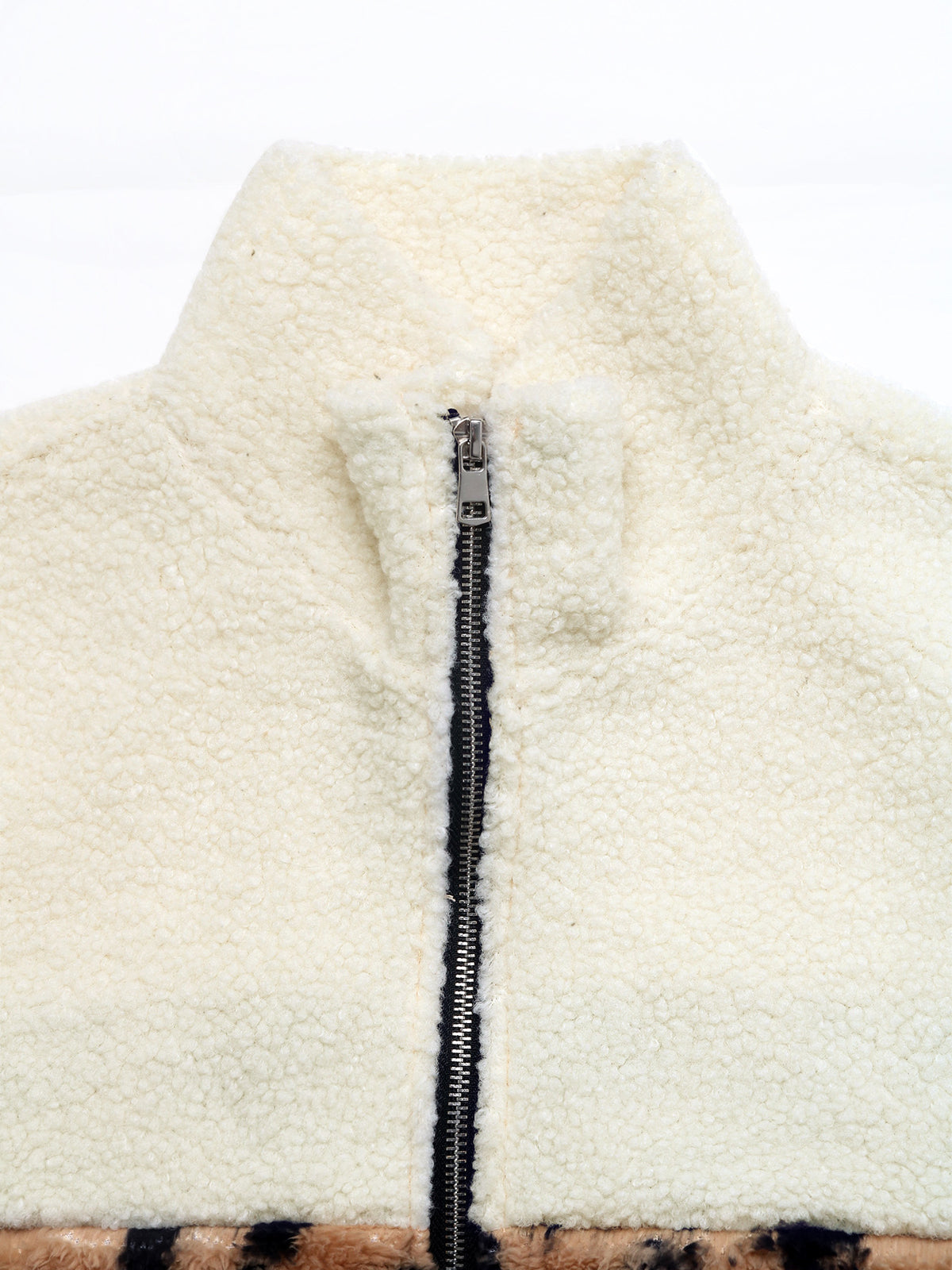 Cream teddy fleece stand collar and black front zip detail
