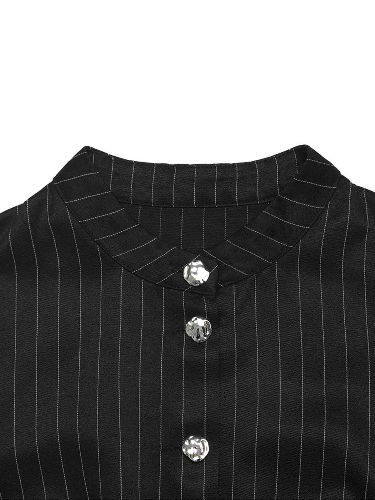 Close-up of a black pinstriped shirt with a mandarin collar and three decorative silver buttons.