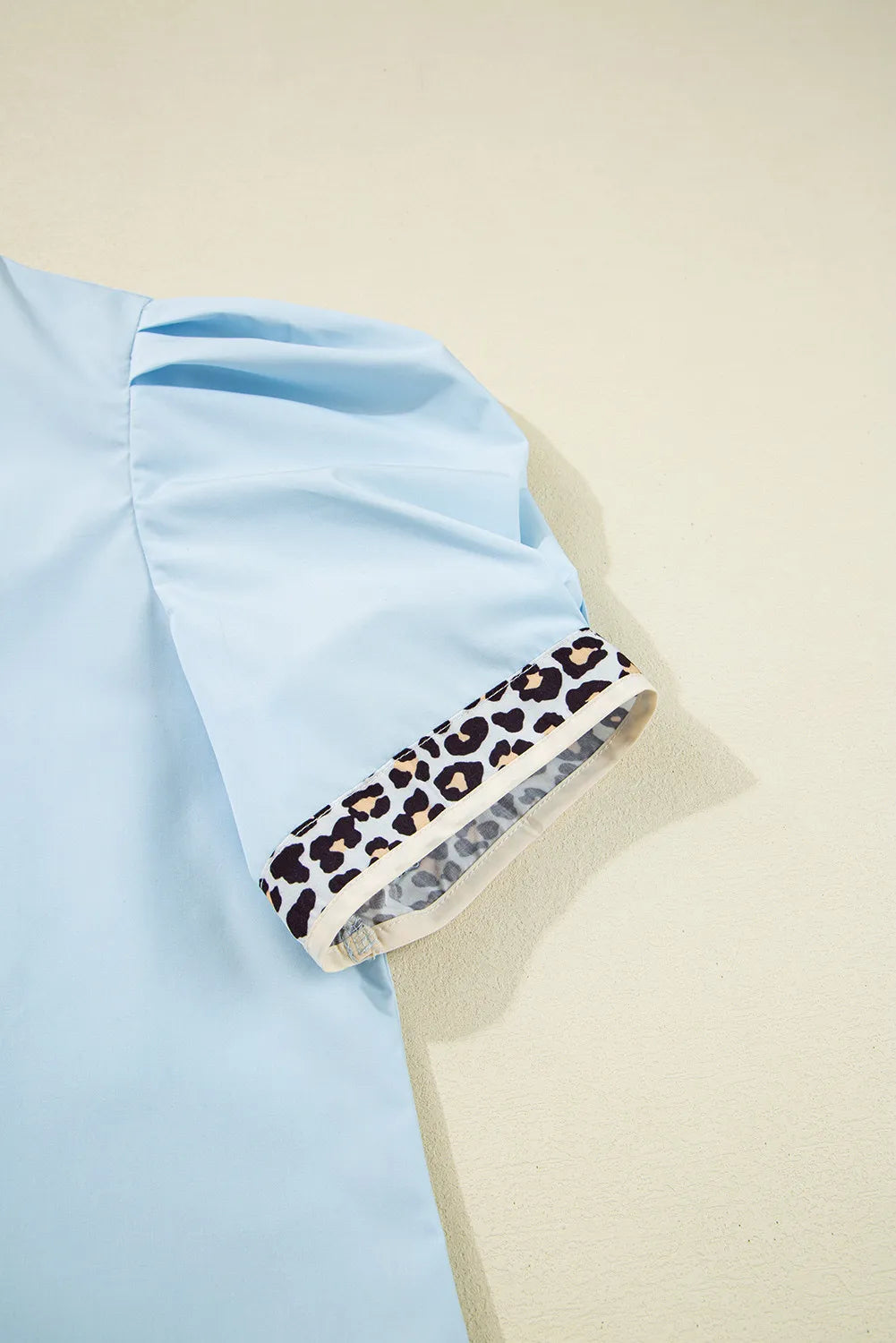 Sky Charm Puff Sleeve Blouse with Leopard Trim