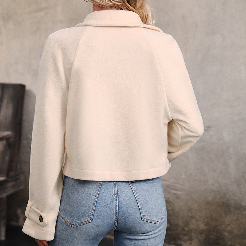 Back view of the cream cropped jacket with notch collar