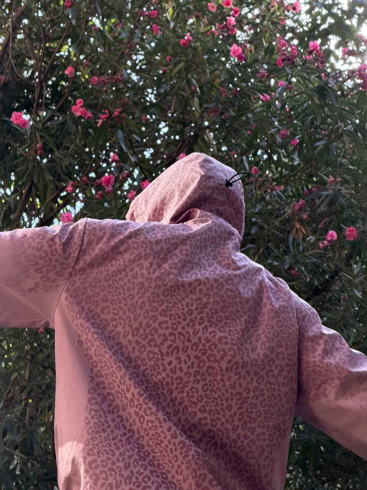 Water Reactive Cheetah Rain Jacket