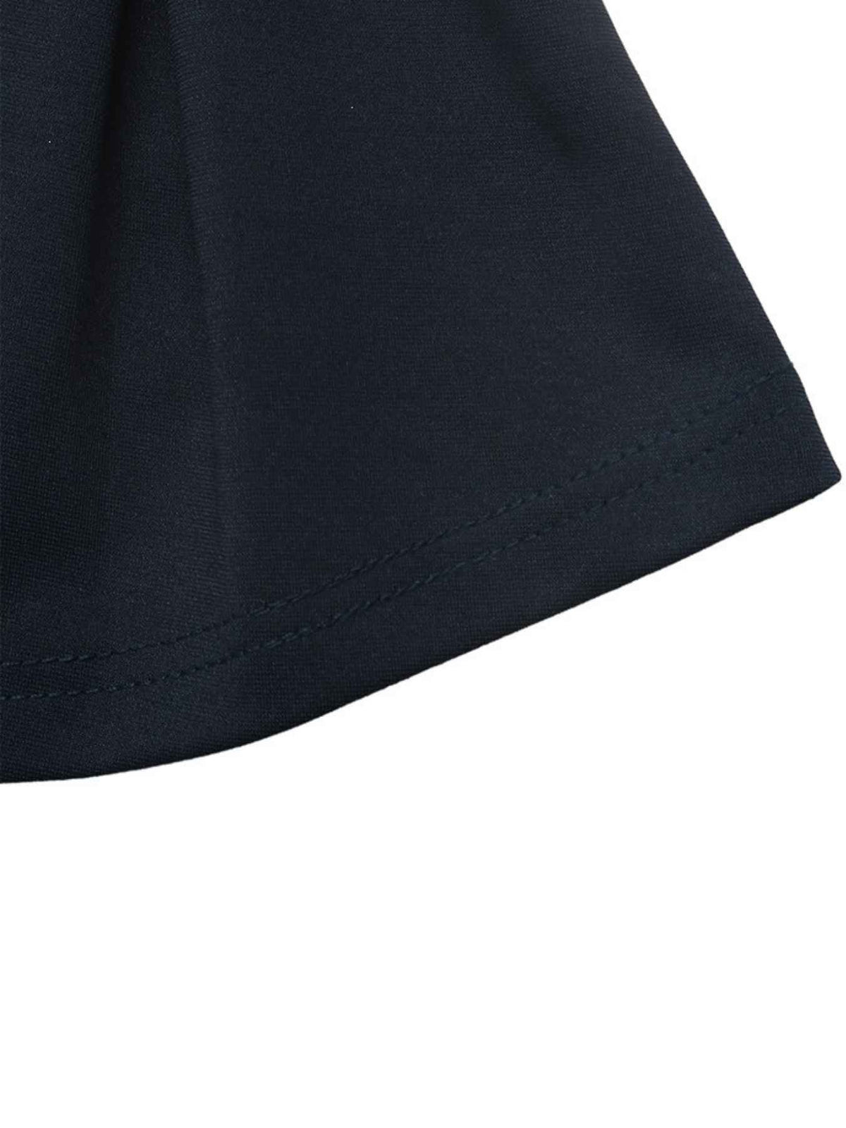 Close-up detail of a dark navy fabric garment corner with a neat hemstitch, shown against a plain white background.