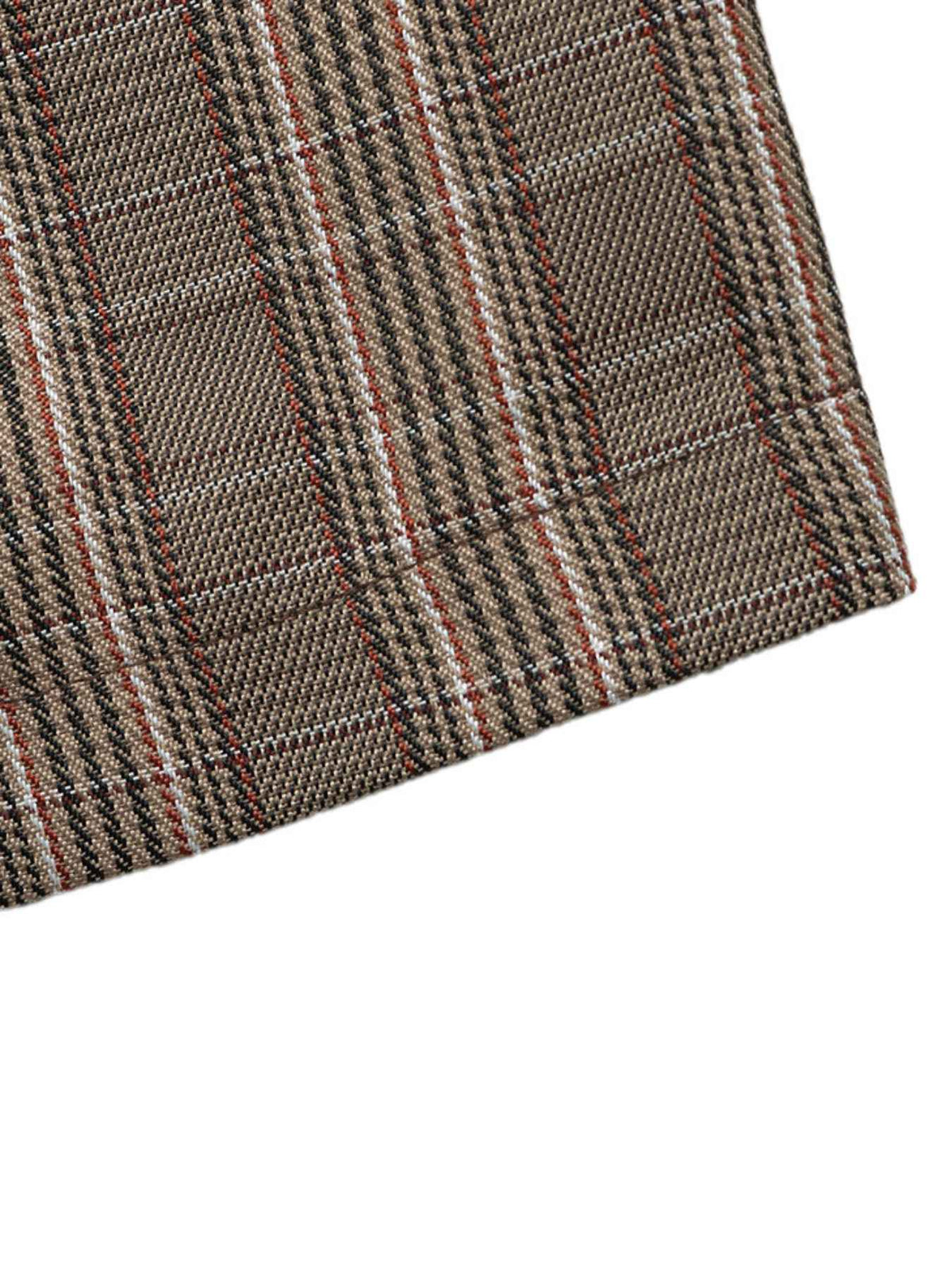 A close-up of a woven fabric with a brown, beige, and red plaid pattern, shown against a plain white background.