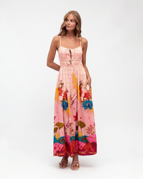 Woman wearing a floral dress on a white background