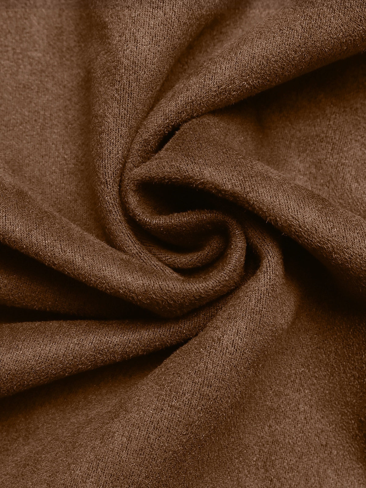Close-up of brown fabric with folds