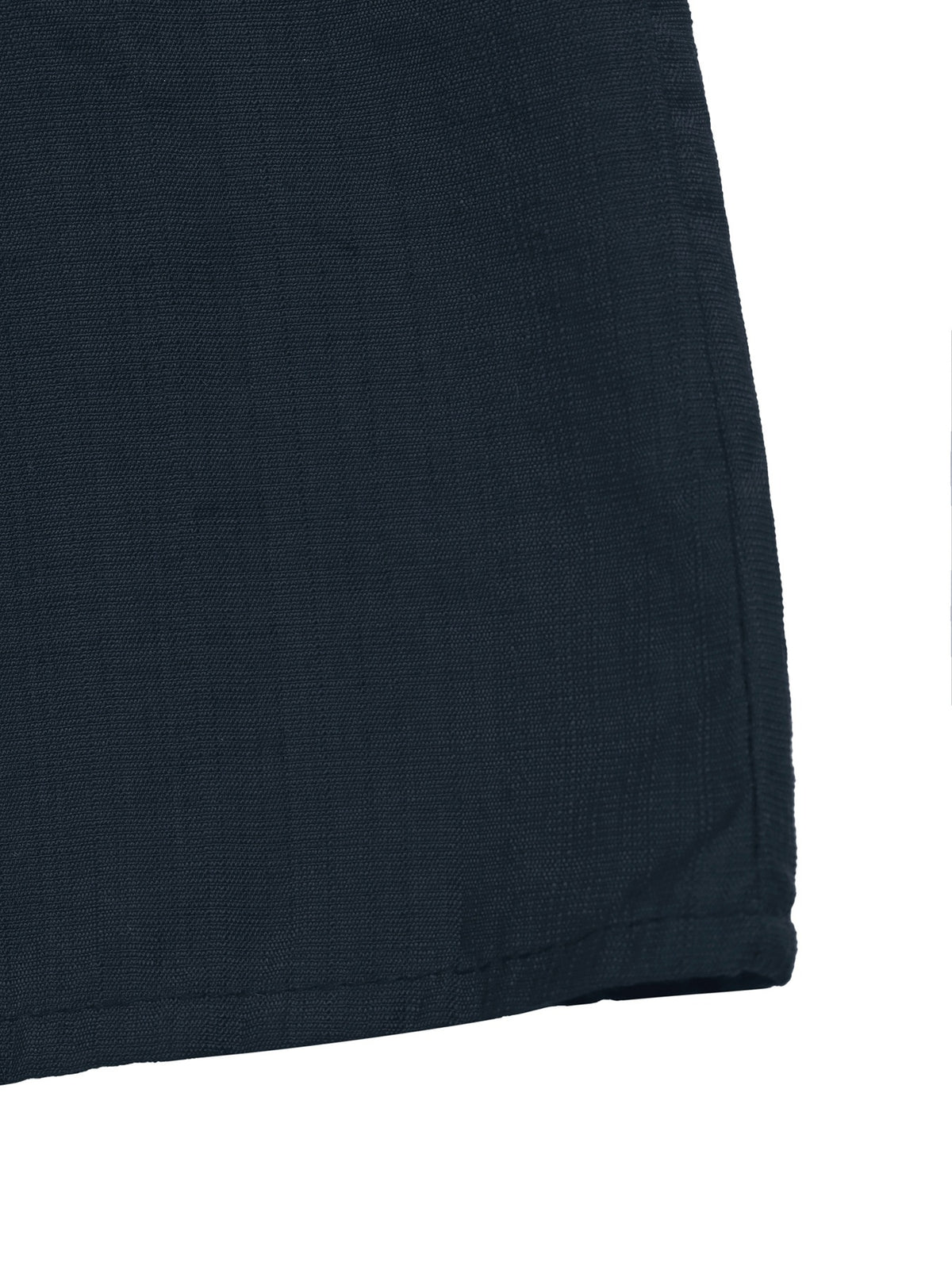 Close-up of a dark navy textured fabric corner with a stitched hem against a white background.