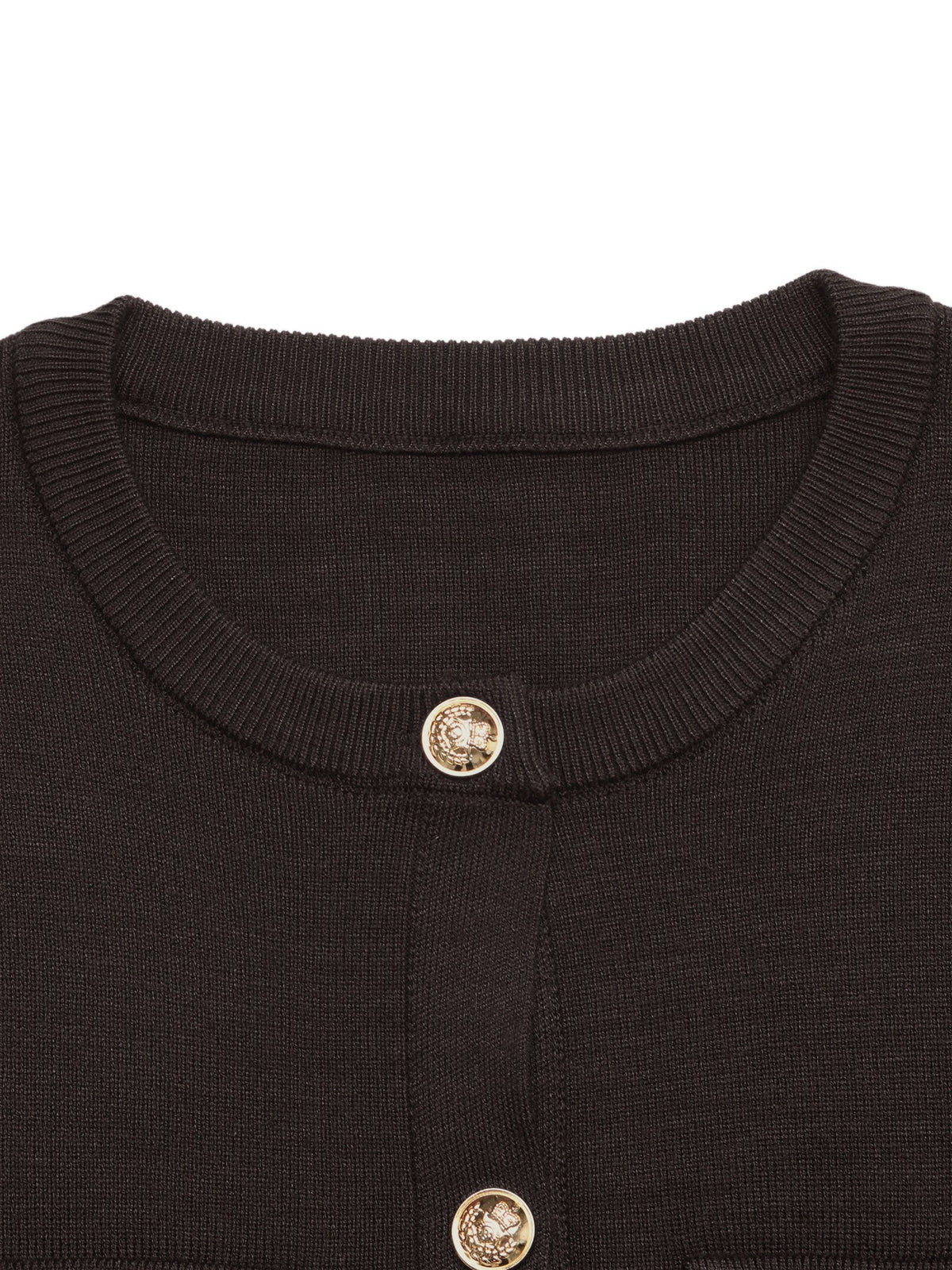 Close-up of a dark brown ribbed knit cardigan sweater featuring decorative gold-tone buttons with a crest design, set against a plain white background.