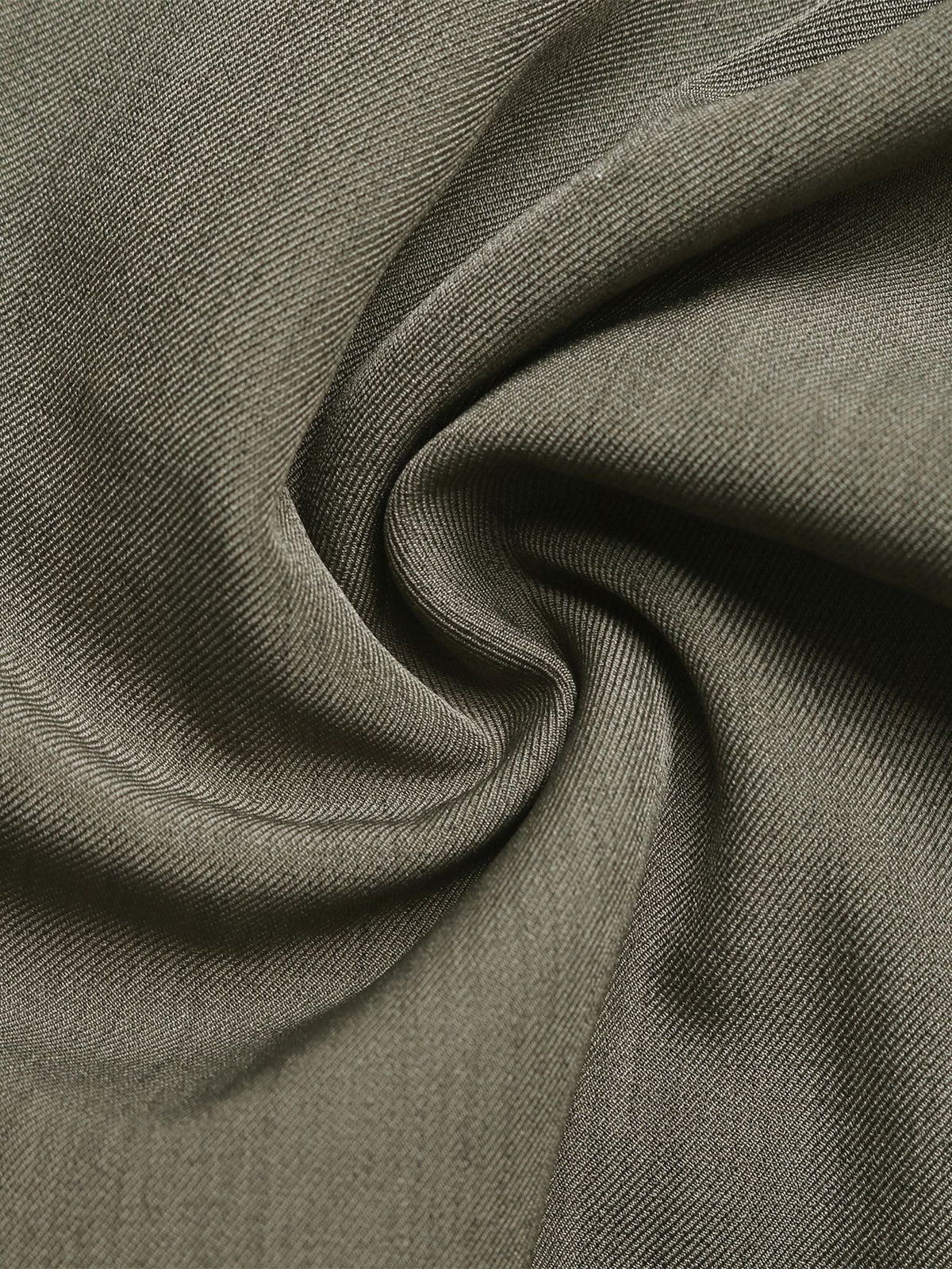 Close-up of olive green fabric with visible texture