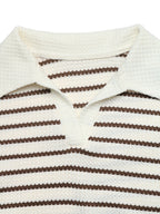 Close-up of a knit polo shirt with horizontal brown and off-white stripes, featuring a textured knit collar and button placket.