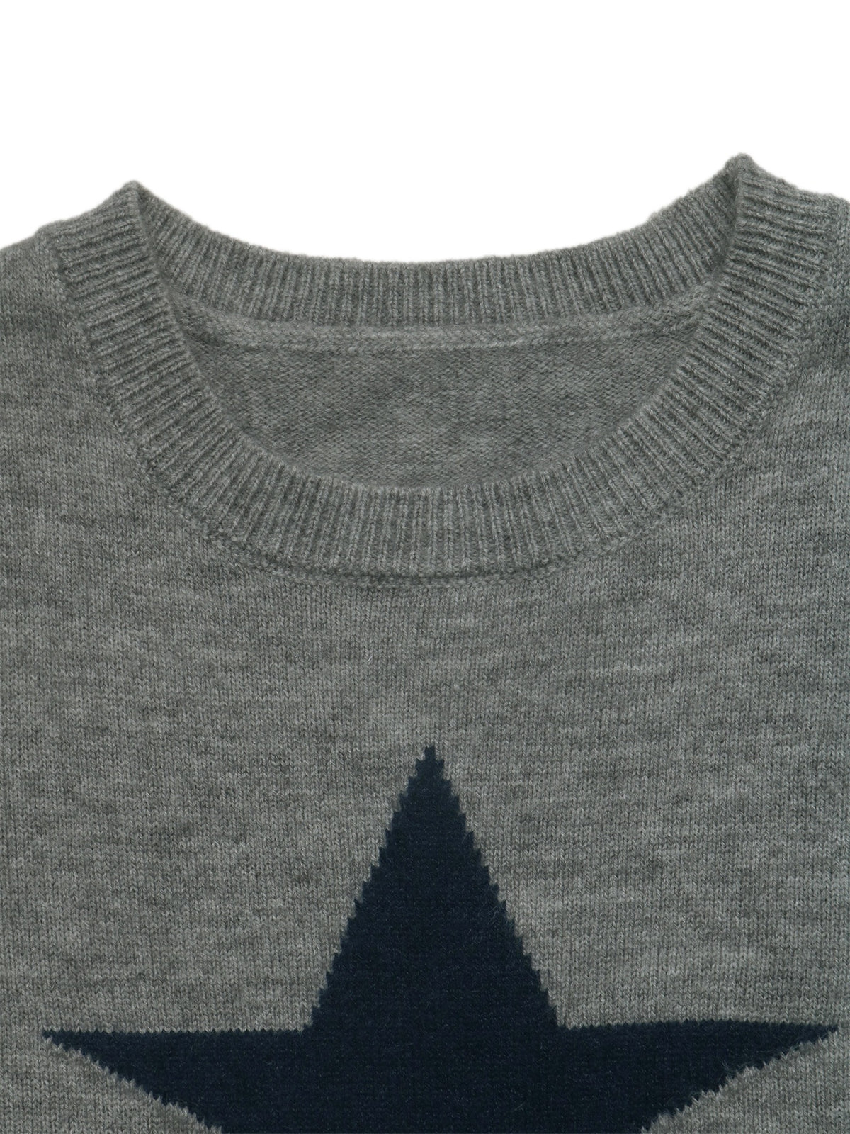 Close-up of a gray knit sweater with a large dark navy star motif on the chest, showing the ribbed crew neck collar.