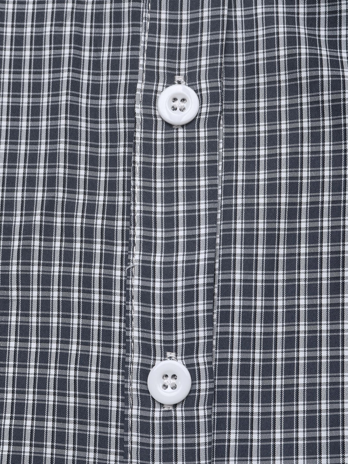 Close-up of a navy and white plaid button-down shirt showing the front plaid pattern and white buttons.